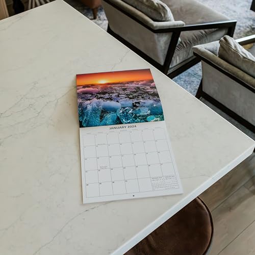 2024 Sunsets Nature Landscapes Travel Monthly Wall Calendar with Four Bonus Months from 2023 16-Month Calendar Starts in September 2023 until December 2024 12" x 24" (when open) 12" x 12" (when closed) Thick Sturdy Paper